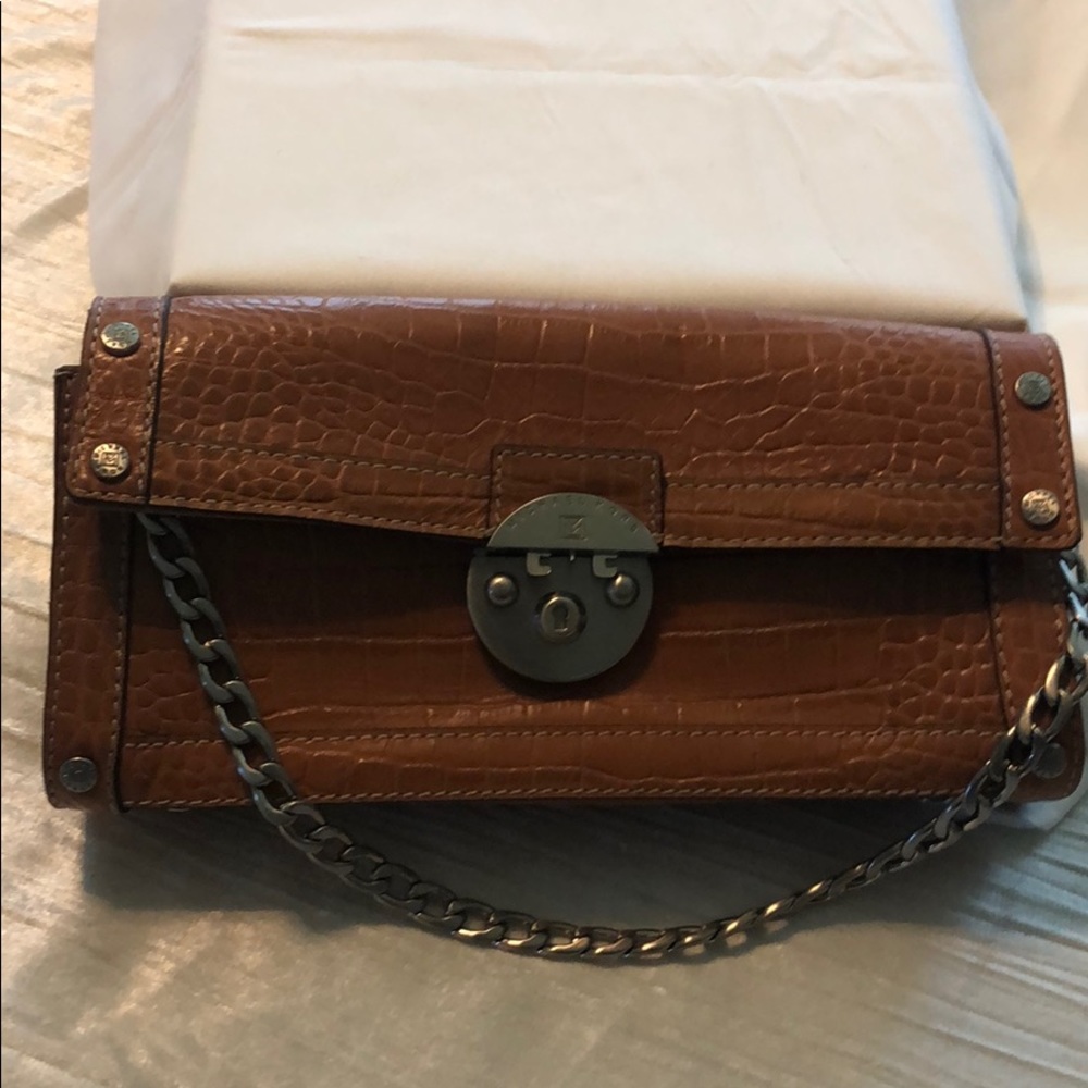 Michael Kors classic clutch bag.